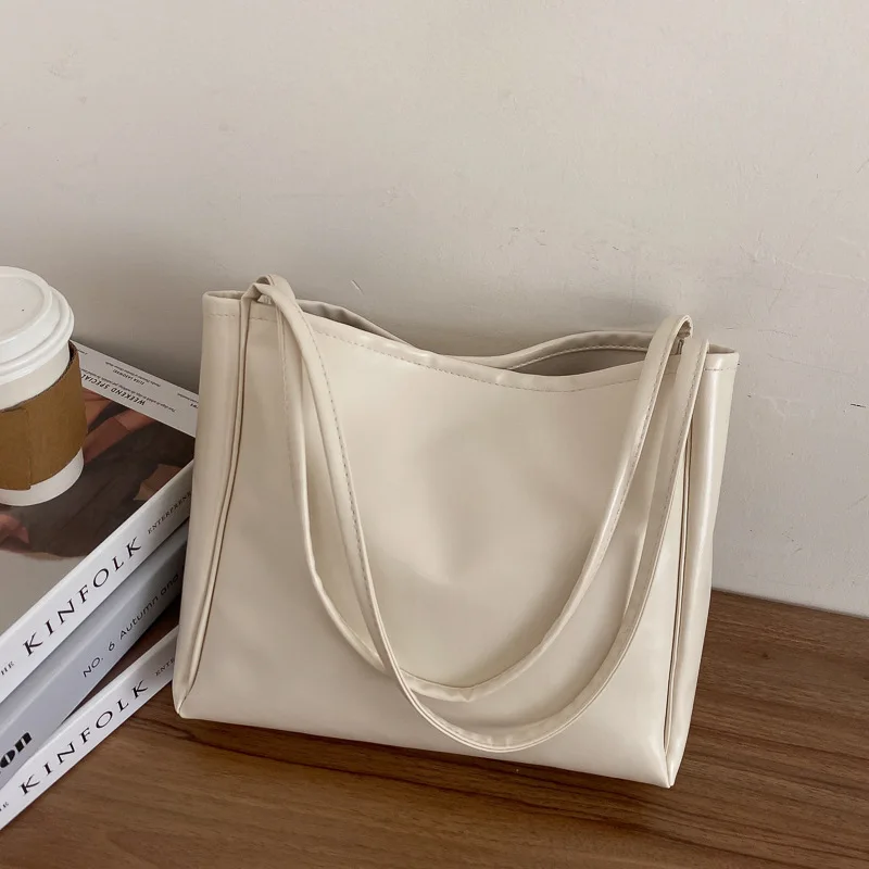 Nuova borsa tote alla moda Temperamento semplice Borsa a tracolla di grande capacità in stile occidentale Borsa per la spesa casual Borsa di design di lusso