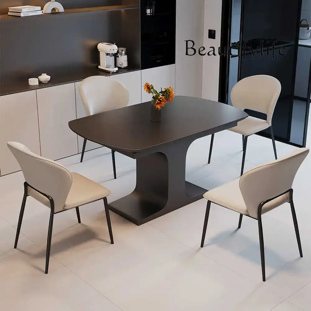 

Minimalist rock slab dining table and chair combination modern simple household rectangular dining table light luxury high sense
