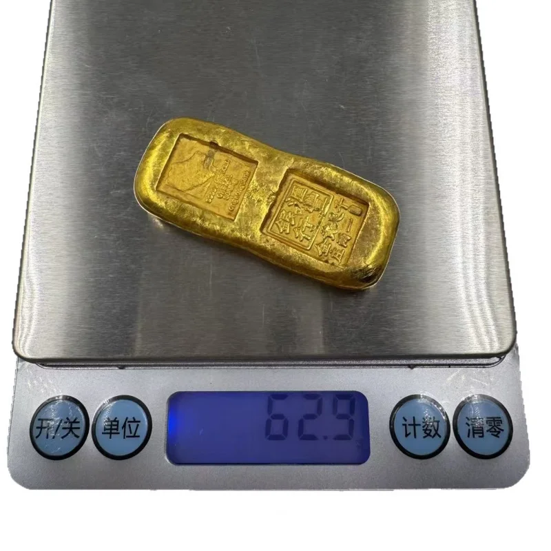 Small yellow fish-shaped ancient copper bars, coins, ingots, gold bricks, brass artifacts for collecting