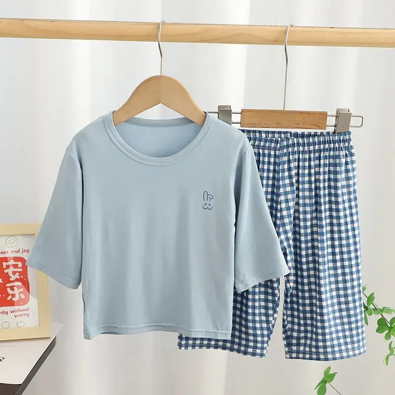 2025 Summer New Childrens Pajama Sets Casual Daily Solid Color Short Sleeve Top + Plaid Loose Pants 2-Piece Set