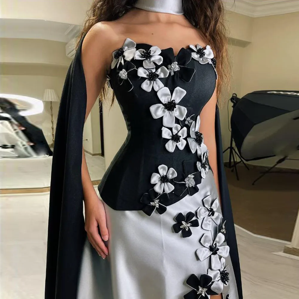فساتين حفلة موسيقية مخصصة باللونين الأبيض والأسود مع لف بدون حمالات مصنوعة يدويًا على شكل زهرة فستان سهرة رسمي بألوان متباينة تلبية حفل فيستدو