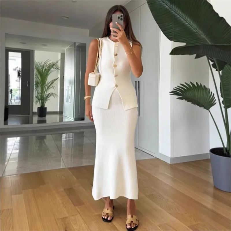 シンプルなスタイルのツーピースセット女性用新作マッチングセットツーピースアウトフィットノースリーブトップススカート無地カラー気質通勤