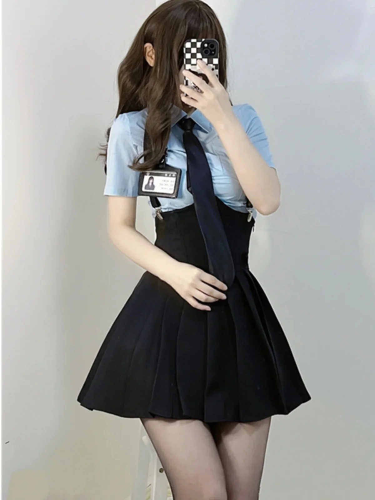 

Сексуальный американский колледж Sle JK orm Set Летняя клетчатая юбка с подтяжками на талии из двух предметов для тренда...