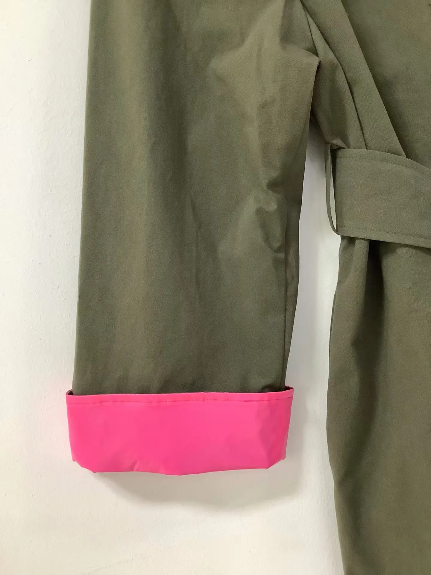 Hello, new color blocked commuting jacket with a cinched waist and long length