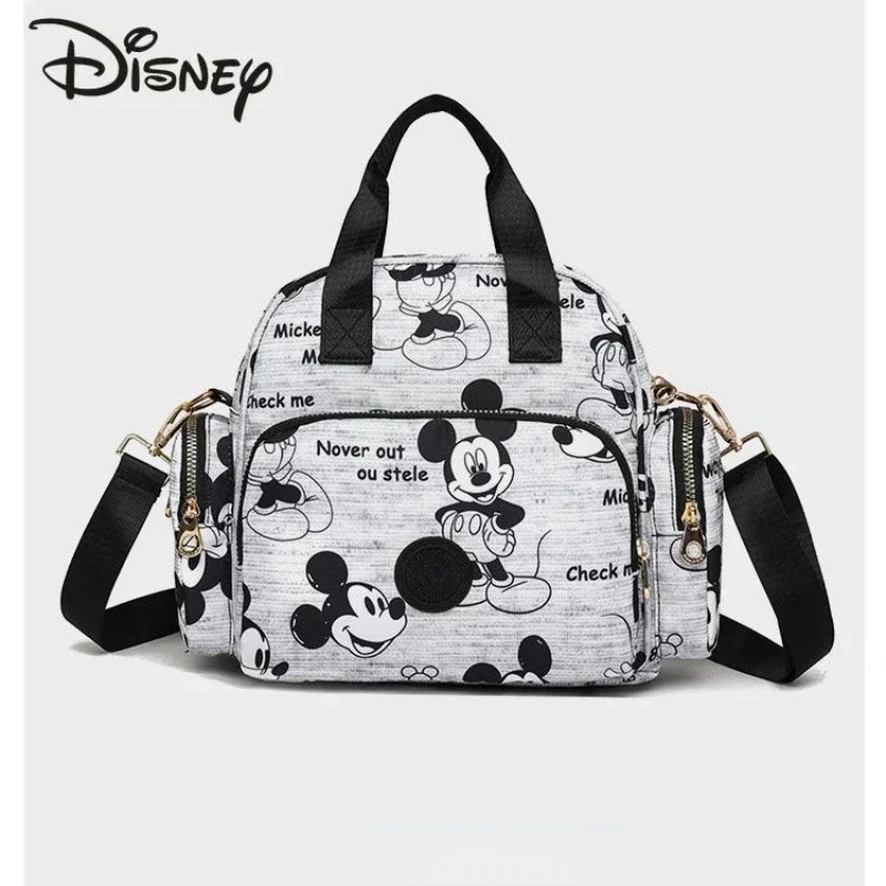 Disney 2024 nuevo bolso urinario, mochila de moda de alta calidad para mujer, bolsa de almacenamiento de mano multifuncional de gran capacidad para mujer