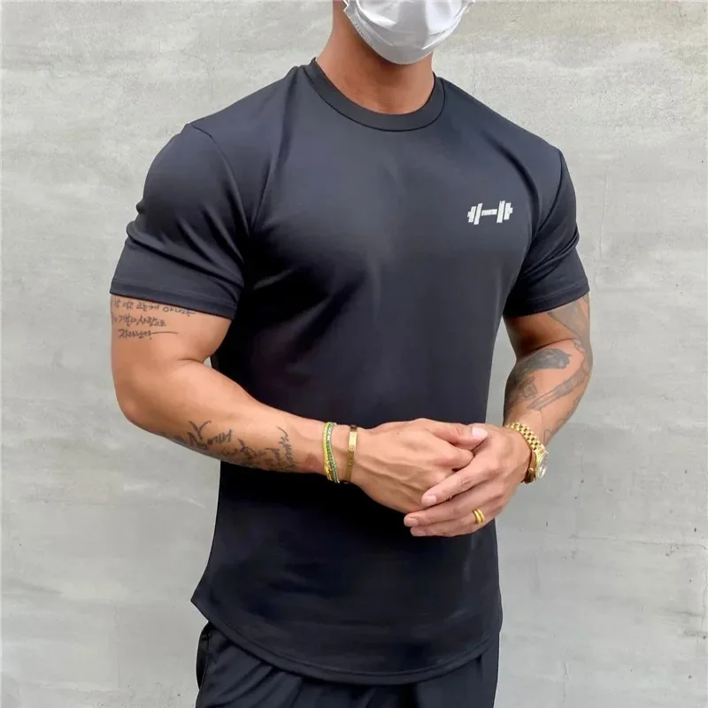 NOWOŚĆ Letnia koszulka na siłownię Mężczyźni Slim Fit sport Fitness topy Bawełniane koszulki treningowe z krótkim rękawem moda Casual t shirt mężczyźni Odzież
