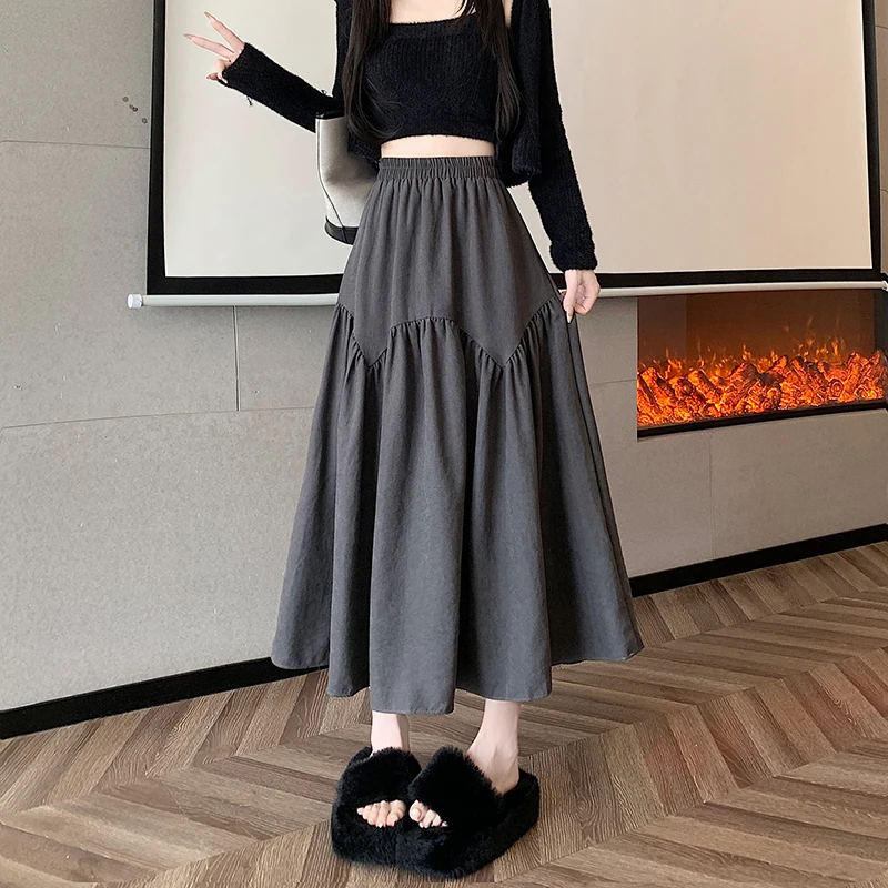 Half length skirt for women in autumn, with a high waist and a drooping feeling. A-line skirt, mid length and large swing skirt