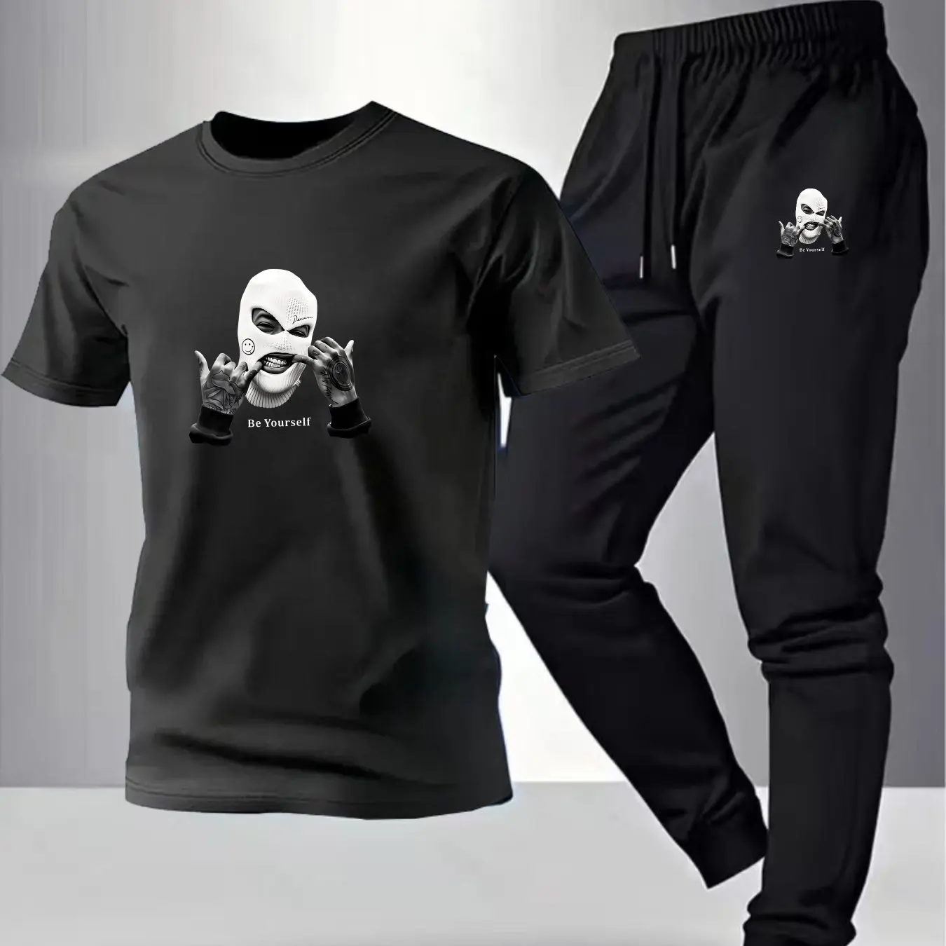 

2026 new Unisex Casual Fashion Two-Piece Set: Cotton T-Shirt & Thin Long Pants with White Mask, Hands and "Be Yourself" Print
