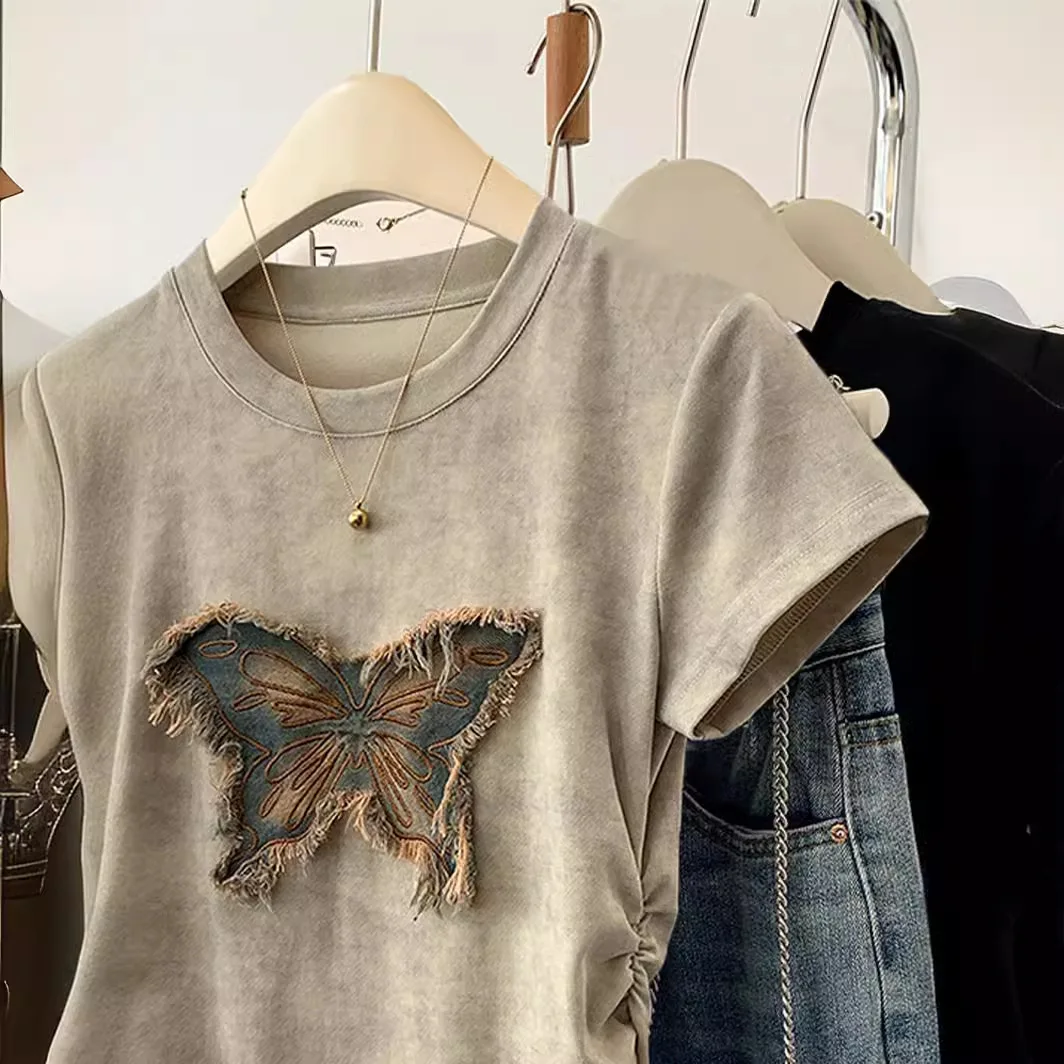 2025年夏の女性用半袖Tシャツ、スパイシーなガールデザインとウエストを締めるスリムフィットショートトップが特徴です