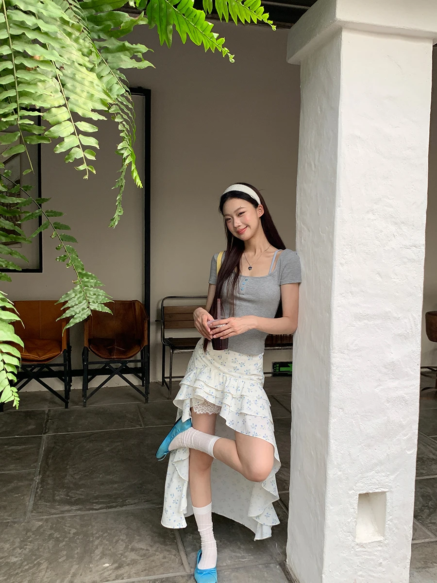 Biała spódnica damska z wysokim stanem, asymetrycznym krojem w kształcie litery A, z kwiatowym nadrukiem, nowa letnia spódnica z wysokim stanem, spódnice damskie.