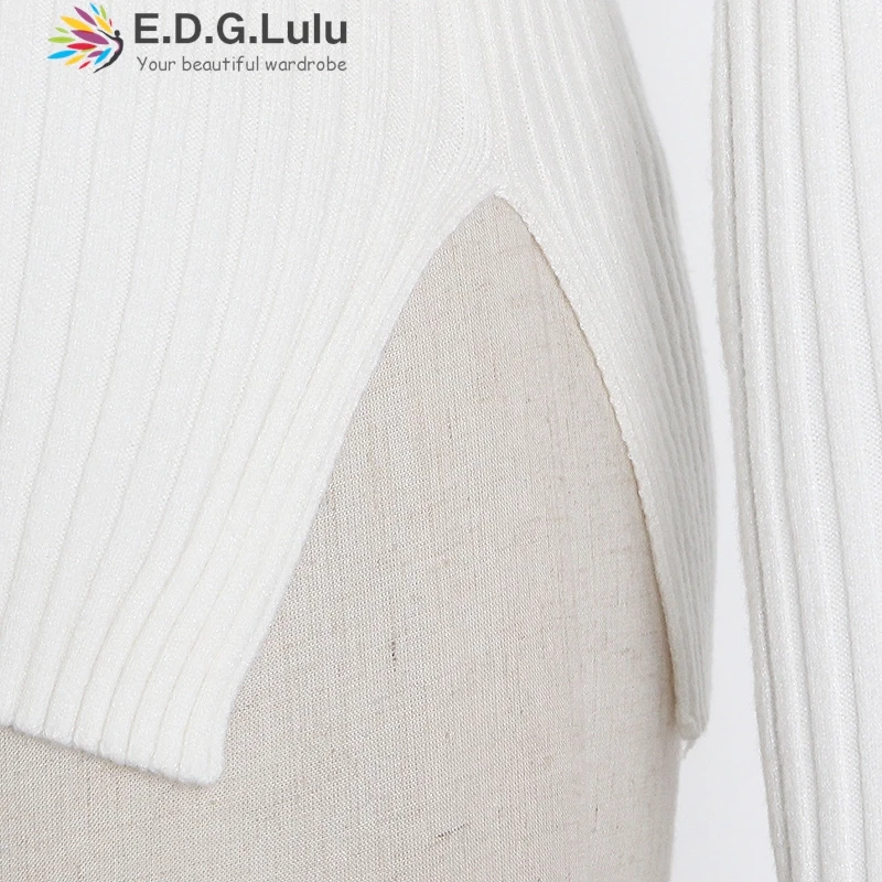 EDGLuLu المرأة س الرقبة واحدة الكتف جوفاء طويلة الأكمام تريكو سليم صالح غير النظامية المرقعة الأبيض بلوفر مغزول 1024