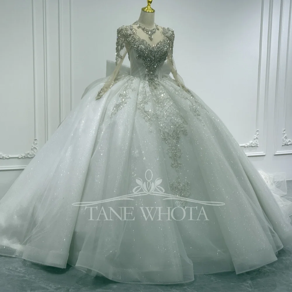 긴 소매 크리스탈 스팽글 리본 키홀 백 레이스업 맞춤형 볼 가운이 있는 고급스러운 O넥 웨딩 드레스 여성용