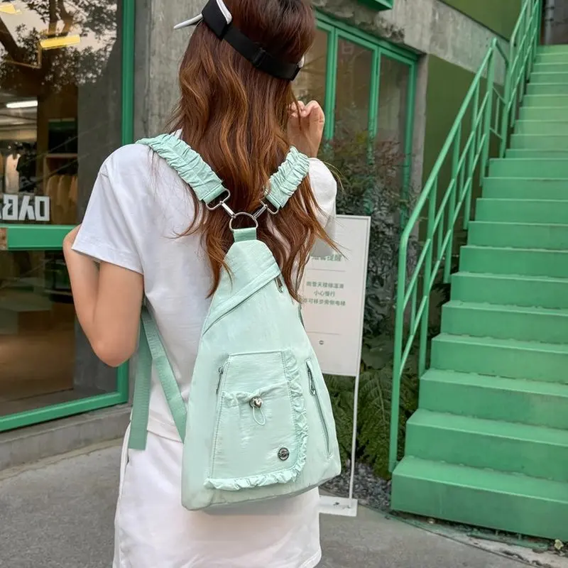 Women Pink Canvas Sling Bag with Ruffle and Zipper Pocket Casual Crossbody Chest Pack for Daily School Travel
