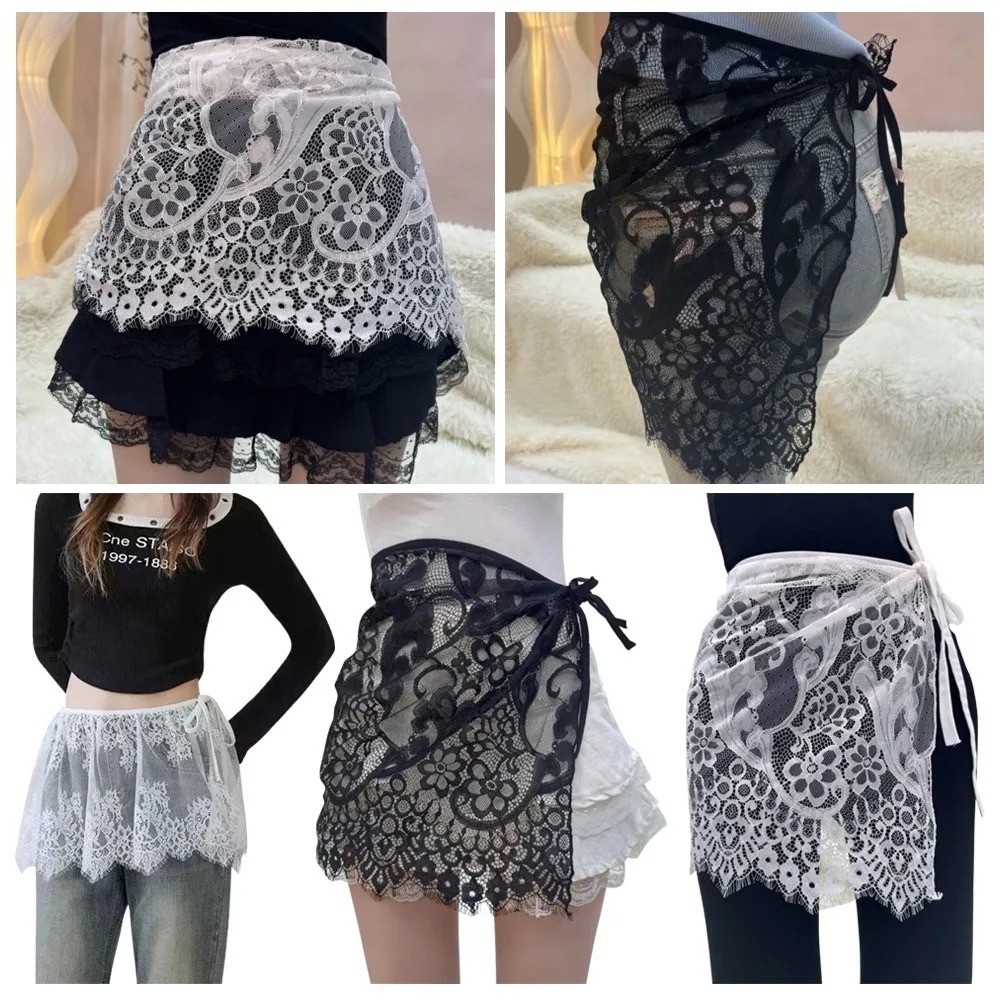 Przezroczysta koronka ​ ​   Koronkowa mini spódniczka ​ ​   Przezroczysta spódnica ​ ​ ​ ​ Regulowane wiązania ​ ​ ​ ​ Koronkowa półspódnica ​ ​ ​ ​ Design w stylu boho ​ ​   Seksowna narzutka ​ ​