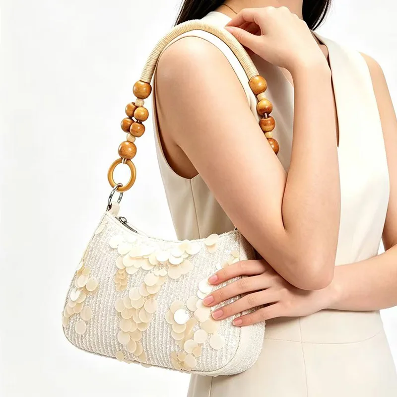 

Wind new women's bag PVC sequined row sewn embroidery bag Bohemian vacation wind beaded rope braided armpit bag