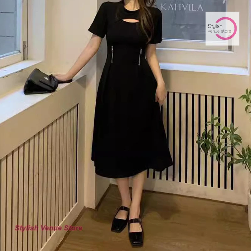 

Summer new black round neck hollow waist slim short-sleeved skirt female French style fashion temperament design sense dress.