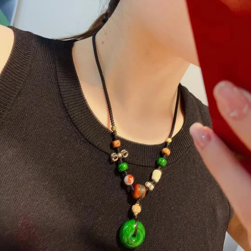 

Gabala Bone Sieve Imitation Angle Peace Hand-Woven Rope Necklace