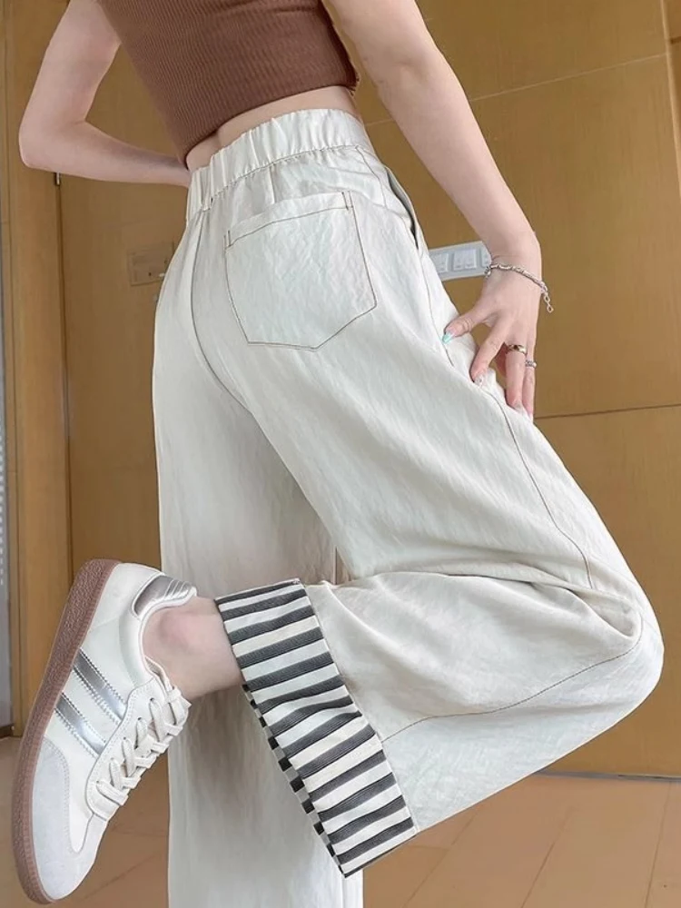 جينز حريم بيج فاتح للنساء لربيع وصيف جديد رقيق وفضفاض مستقيم قطع تسع نقاط أبي الخيار السراويل عالية الخصر...