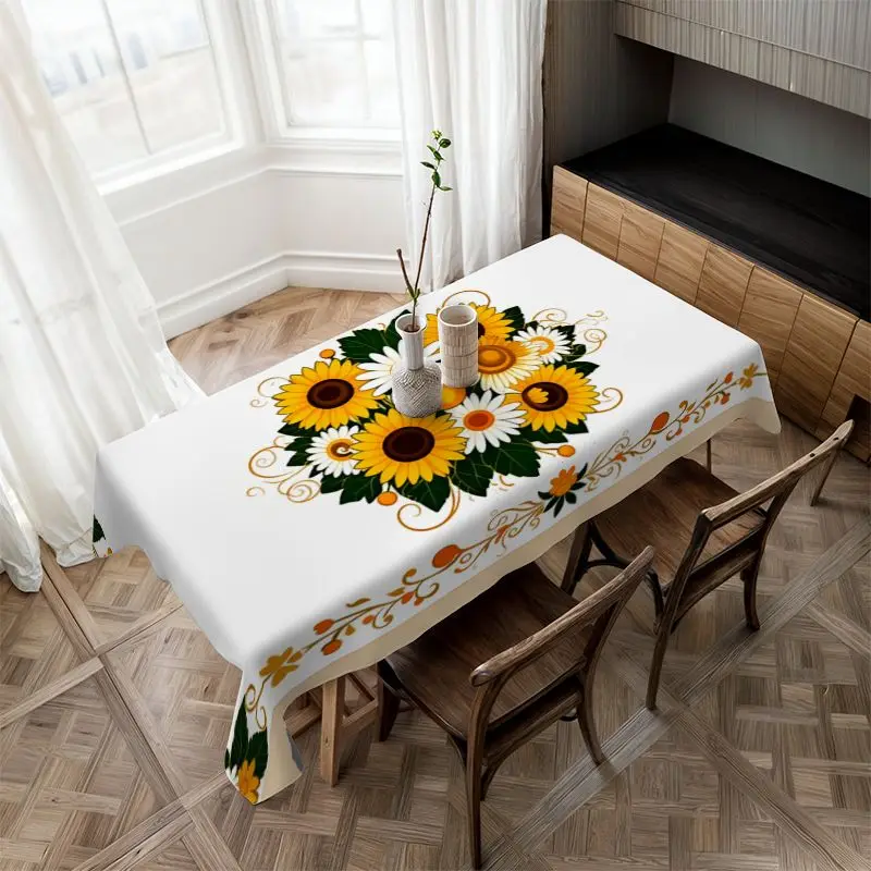 A piece featuring a flat tablecloth with a design of sunflowers and daisies in floral vines.zyc