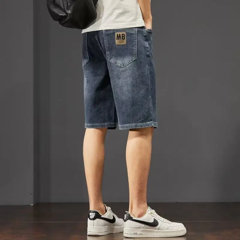 

Летние тонкие мужские джинсовые брюки, повседневные эластичные брюки со средней талией на пять футов, молодежные трендовые прямые брюки, облегающие брюки, весна-осень