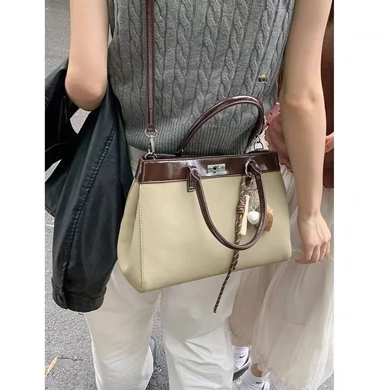 South Korea Niche Portable Kelly Bag Women's Autumn 2024 New Fashion Retro Commuter Bag Shoulder Messenger Bag