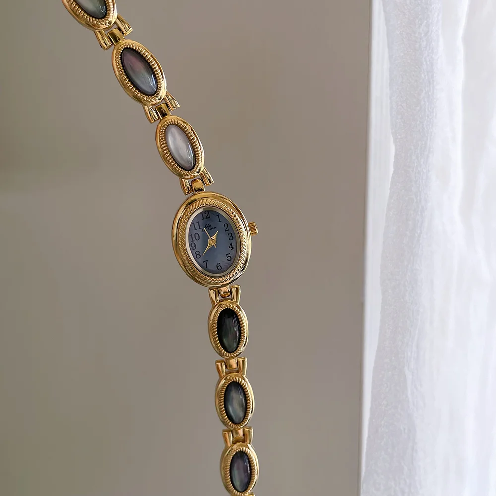 الرجعية الحد الأدنى الساعات النسائية البيضاوي الطلب الصغير الذهب مزاجه لطيف كبار الشعور من أناقة الكوارتز ساعات المعصم النسائية