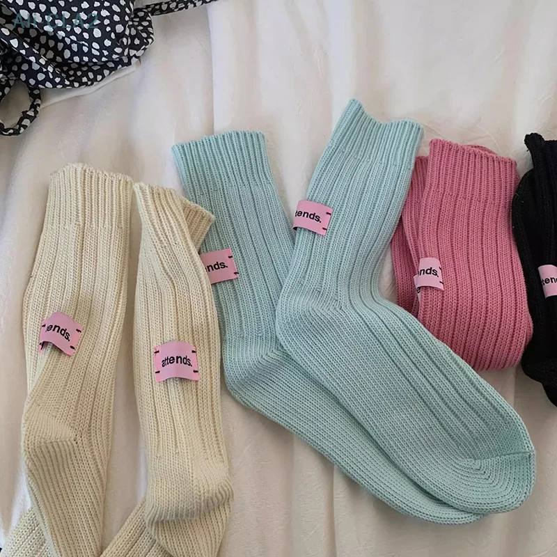 Chaussettes empilées en coton à tube moyen pour hommes et femmes, fil optique coréen, étiquette rose simple japonaise, chaussettes de sport pour couples