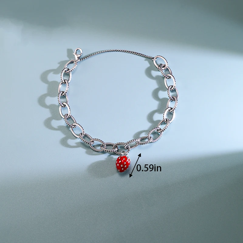 

Genuine 925 sterling silver James Avery textured oval charm bracelet paired with a strawberry pendant