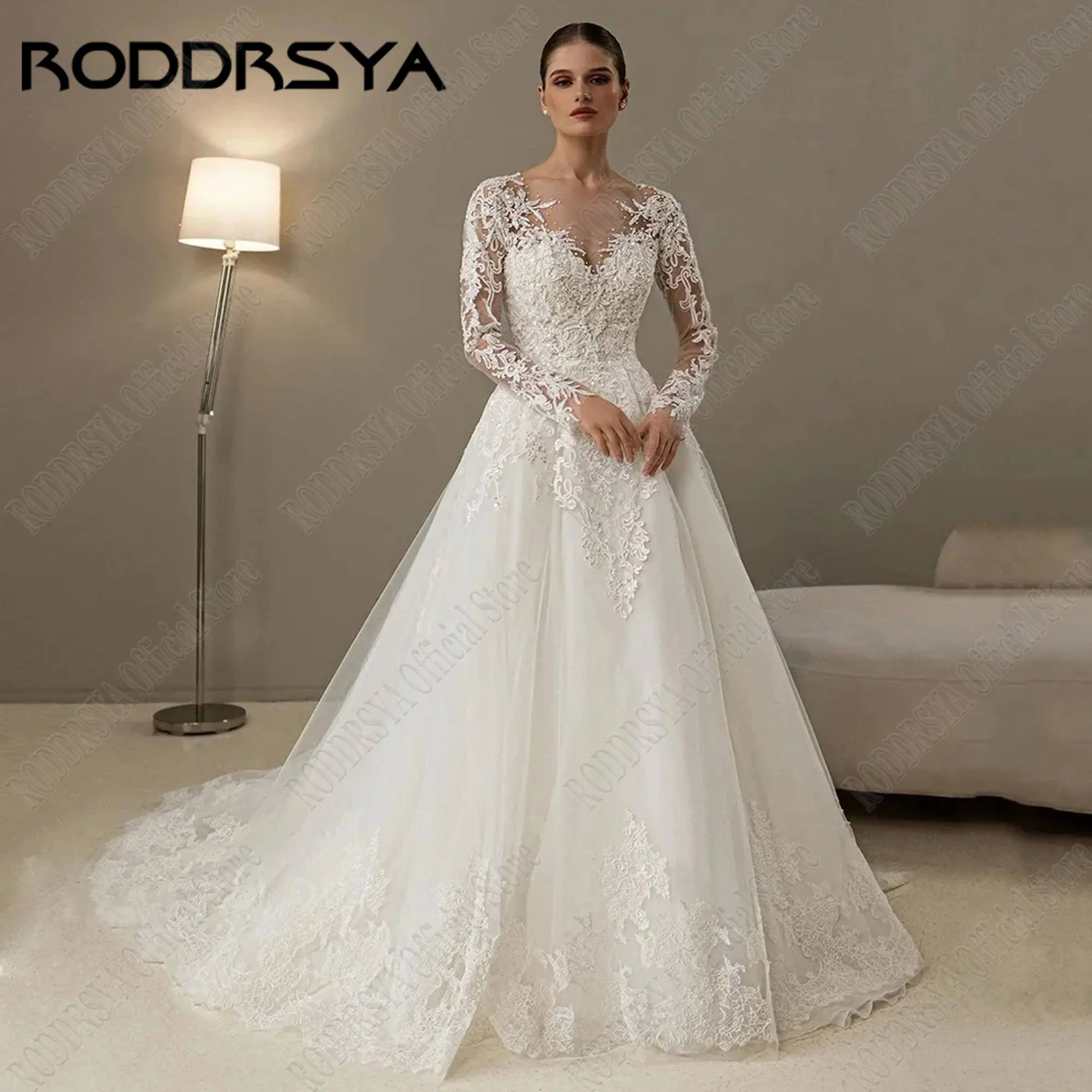 RODDRSYA Mangas Compridas Lace Vestido De Noiva 2025 A Linha Botão Voltar Vestido De Noiva O Pescoço Applique Tulle Personalizado Vestido De NoivaRODRSYA Mangas Longas Renda Vestido de Noiva 2025 A Linha Botão Voltar V