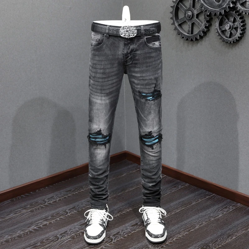 Modeontwerper Heren Jeans Hoge kwaliteit Retro Zwart Grijs Stretch Skinny Fit Gescheurde Jeans Heren Lederen Gepatchte Hip Hop Merkbroek