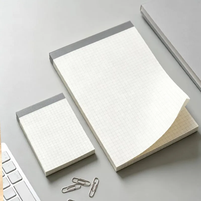 A grid cover notebook with thick paper, smooth writing, suitable for daily, school, and office use (70 sheets/book)
