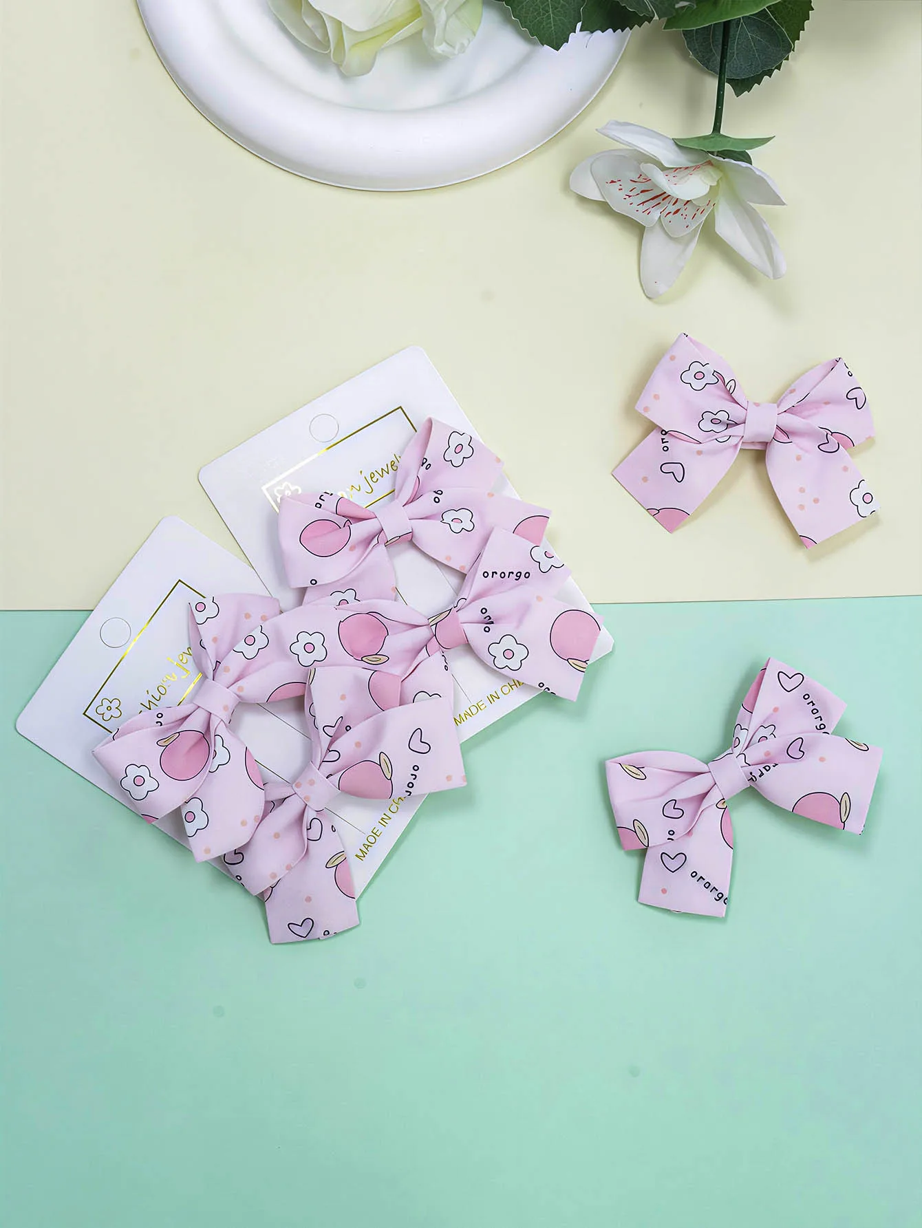 

1pc.（2 units）Sweet lovely hair clips with floral patterns featuring fabric bows pink peach-shaped and heart-shaped small flowers