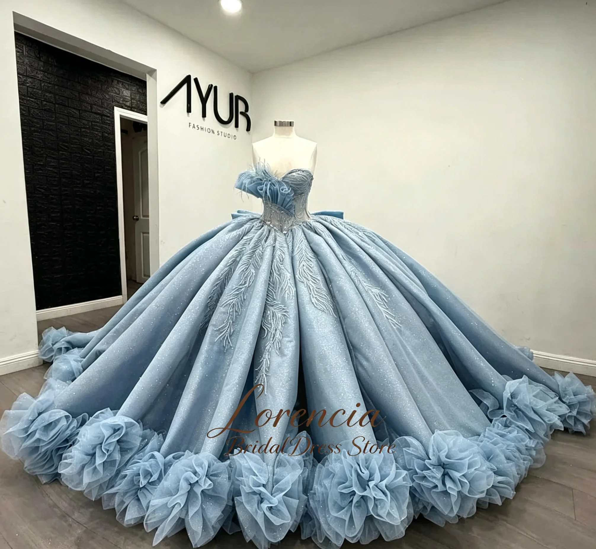 Elegant Quinceanera Dress With Beaded Feather Details Strapless Bodice Ruffled Tulle Trim Customized Vestido De 15 Quinceañera
