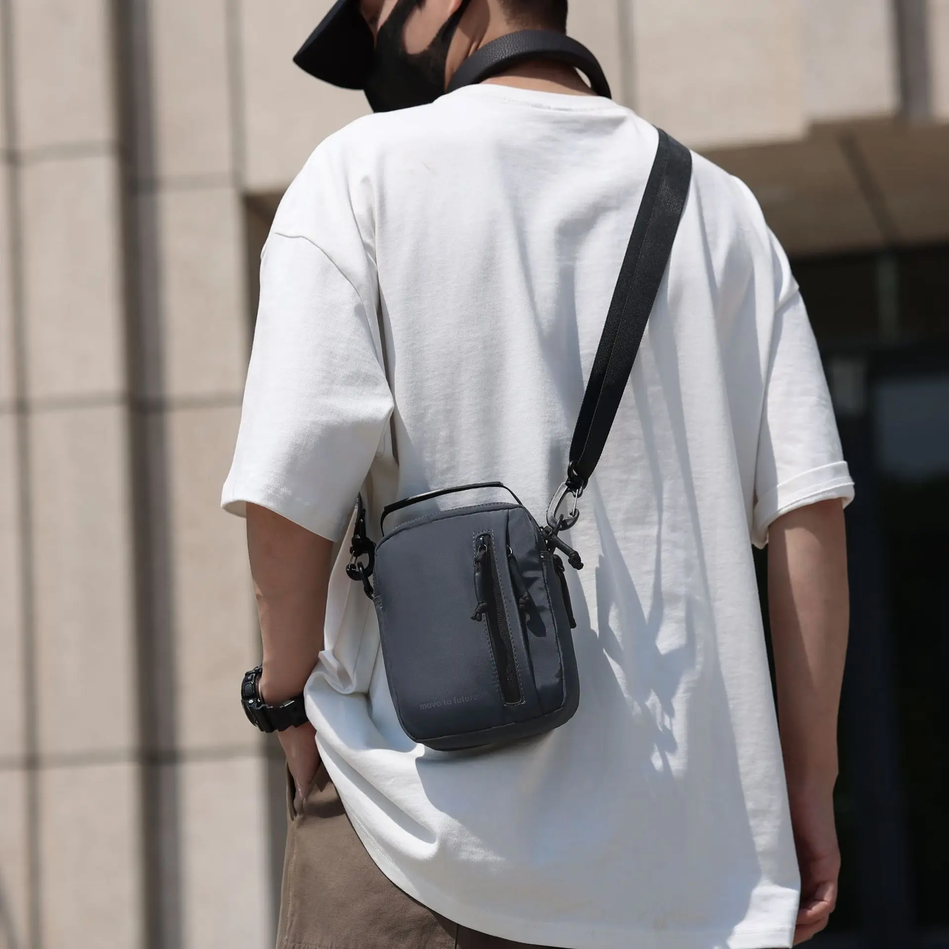 

Lightweight waterproof large capacity men's backpack square multi-function diagonal cross commuting small backpack