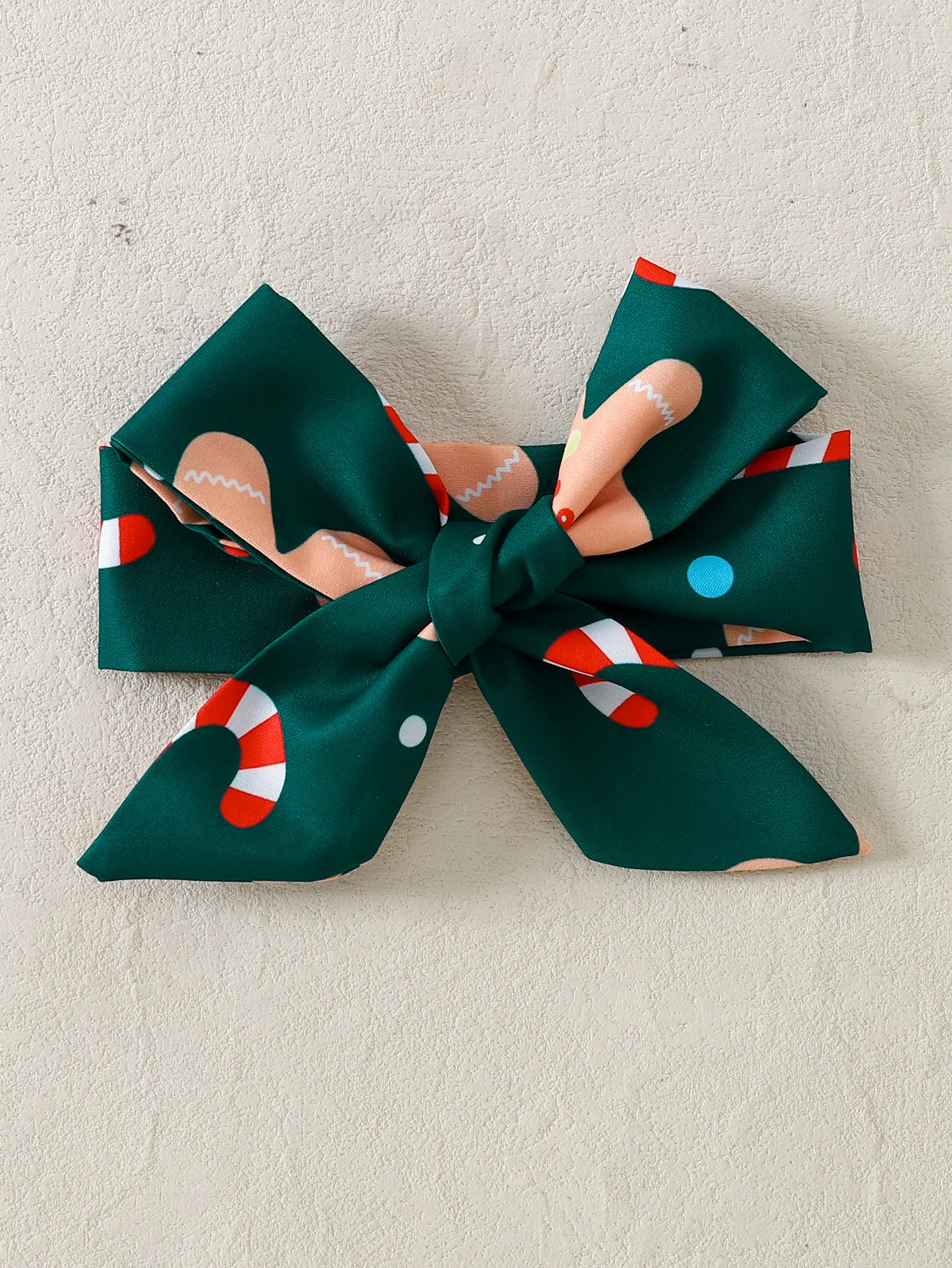 Lebkuchenmädchen-Outfit-Set mit Weihnachtsmotiv, mit Spitzenärmeln, bedruckten Overalls mit Innenmatch und großer Schleifendekoration für Babys – Detail 3