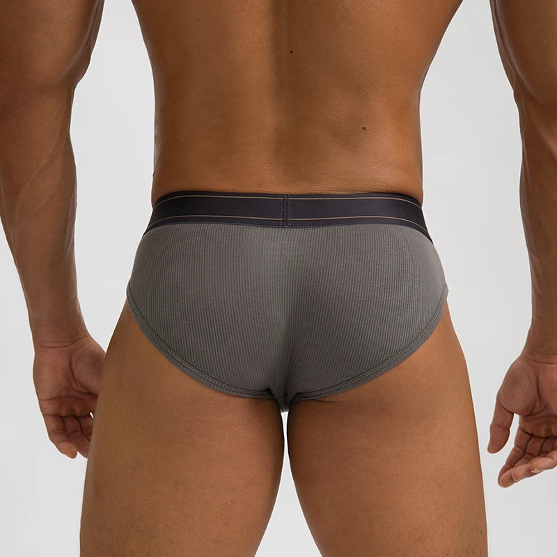 Calzoncillos suaves modales para hombre, ropa interior Sexy con bulto en U, bolsa para pene, calzoncillos transpirables de cintura media, bragas de