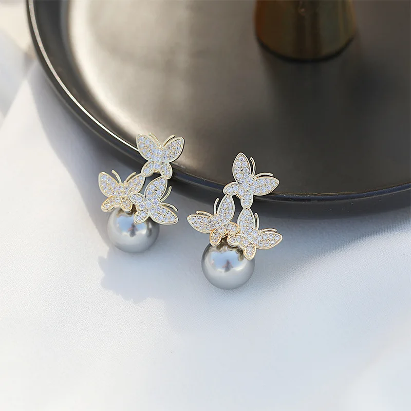 925 Silver Needle Exaggerated Personalized Fashion Pearl Earrings With Micro Set Zircon Autumn And Winter Earrings Butterfly Ear