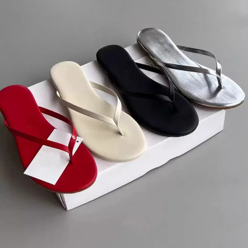 2025 nuevas zapatillas de primavera/verano/mujer, sandalias de playa de color caramelo, chanclas de moda salvaje para exteriores para mujer