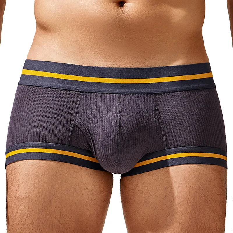 Sexy men\'s boxer shorts with low waist and comfortable front opening pockets, breathable scrotum and hip lifting triangle pants