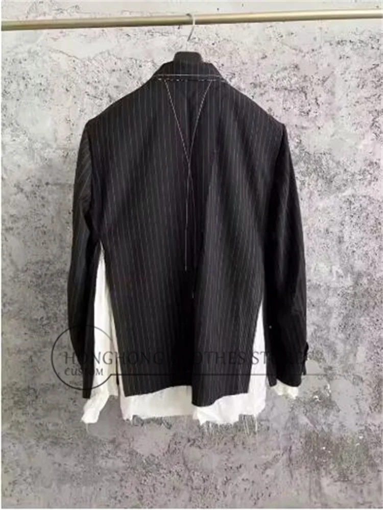New original deconstructed black and white striped suit, with frill lines decorating the high-quality coat