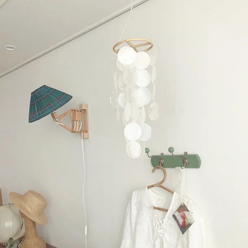 INS Stile nordico Sonagli per bambini Conchiglia fatta a mano Campanelli eolici Culla Letto Campana Camera dei bambini Asilo nido Appeso Decor Puntelli per fotografia