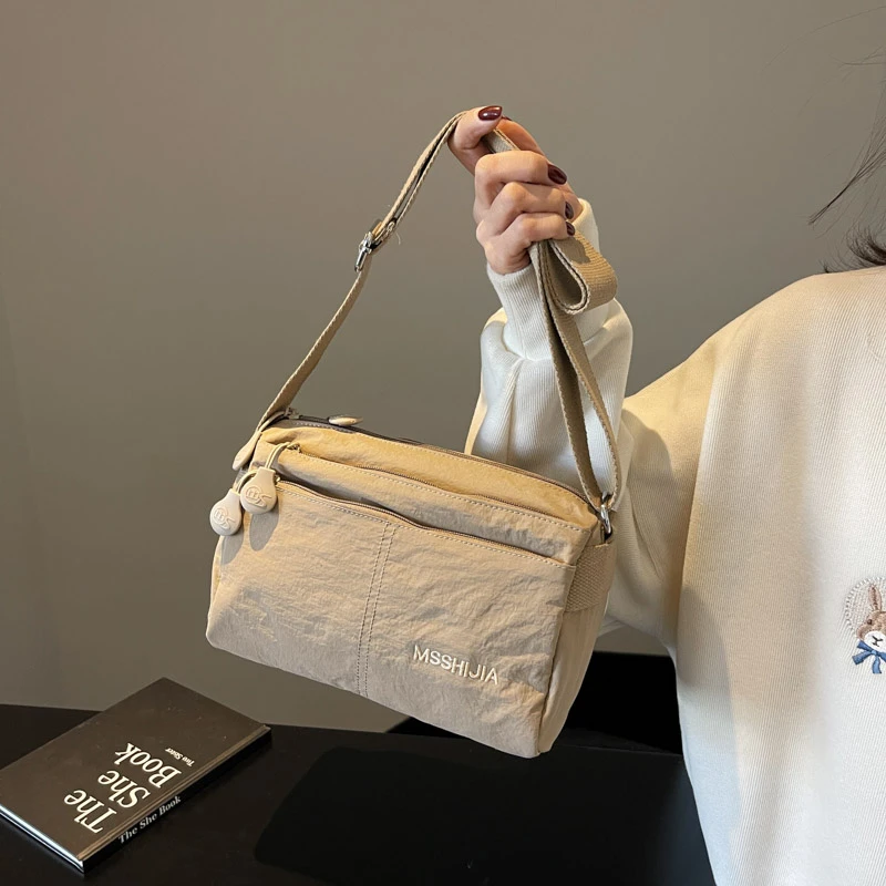 Fashion Ladies Nylon Messenger Bag-spacious And Light, Versatile Solid Color, Zipper Opening And Closing, Suitable For Daily Use