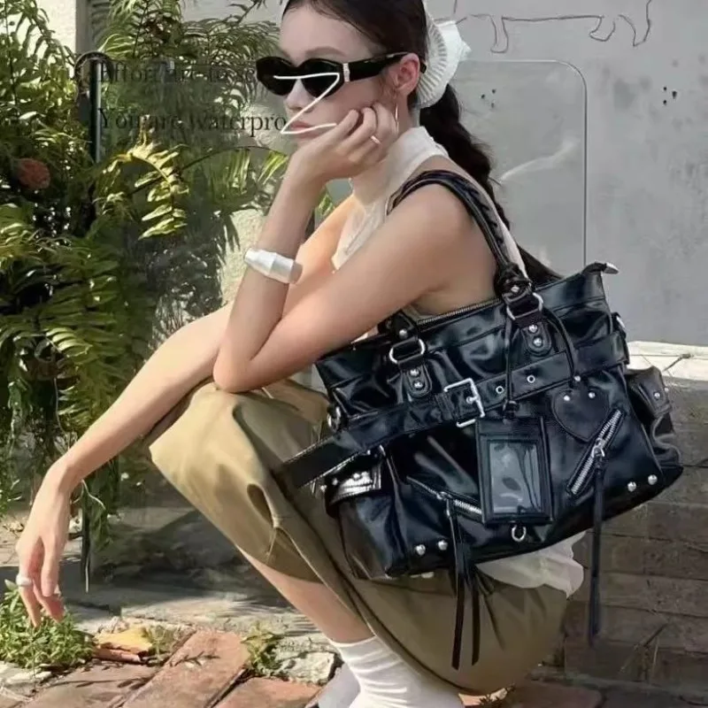 

2026 Versatile Single-shoulder Armpit Bag Fashionable Rivet Tassel Motorcycle Bag Large-capacity Travel Hand-held Crossbody Bag