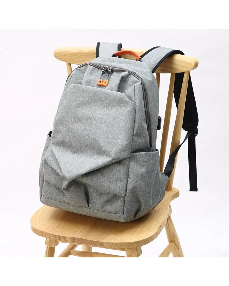 

Student school bag men's and women's Korean version of the tide backpack light outdoor travel and leisure 14-inch computer