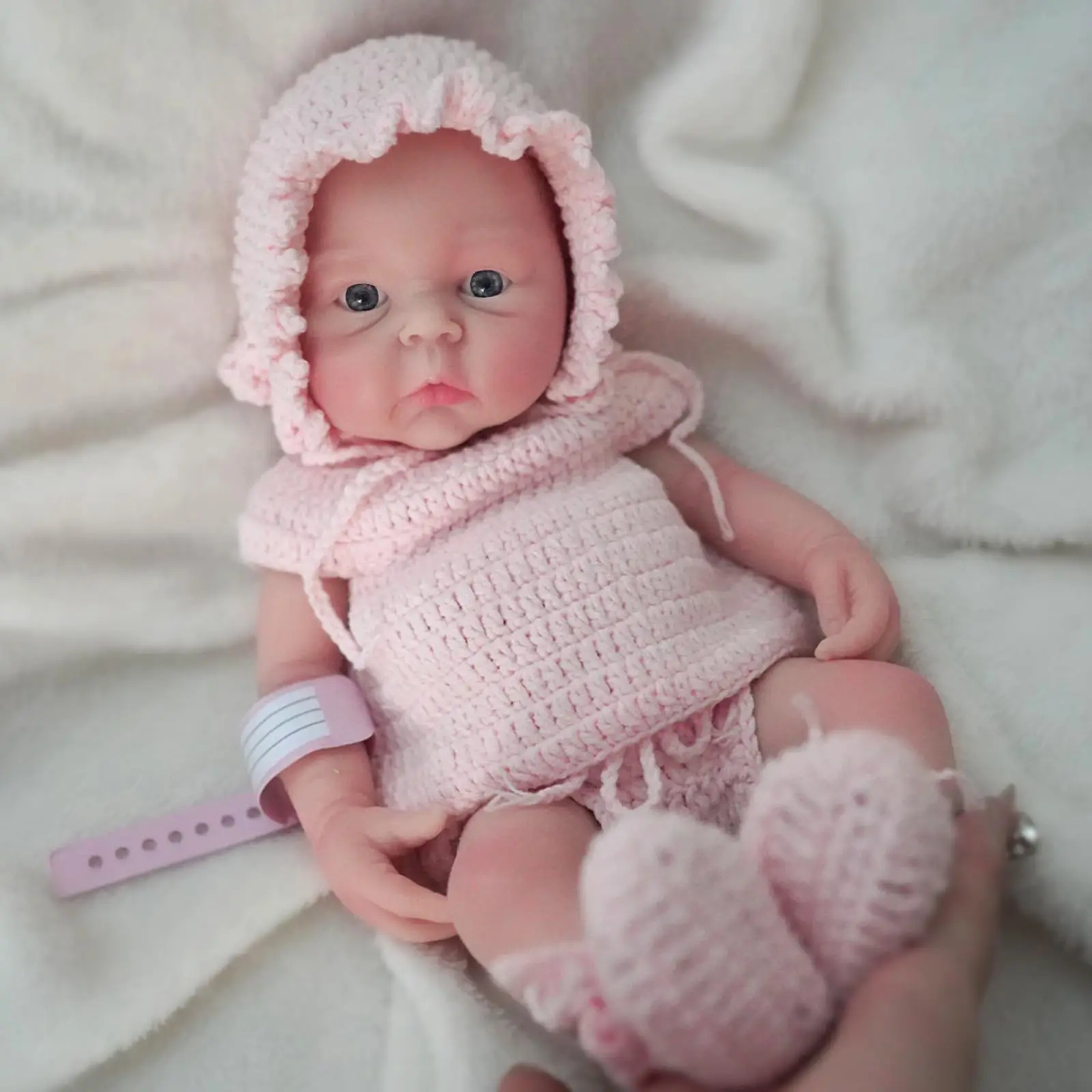 12 Zoll große, lebensechte Reborn-Puppe aus weichem Silikon mit rosa Outfit und Zubehör, inklusive süßer Puppenkleidung – Detail 1