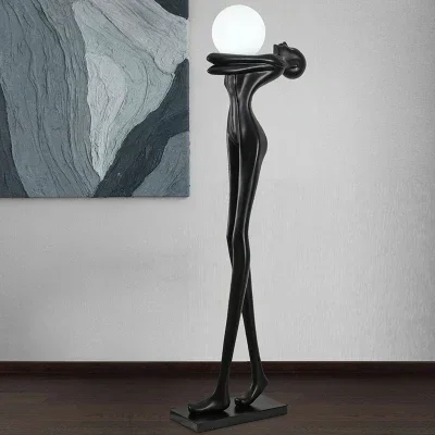 Humanoid sculpture holding ball floor lamp designer exhibition hall villa sales department decoration