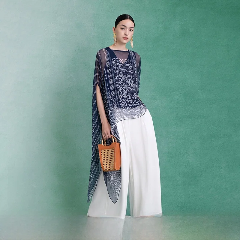 

Новая летняя женская повседневная блузка свободного кроя из двухцветного шелка с круглым вырезом, коротким рукавом и цветочным принтом.