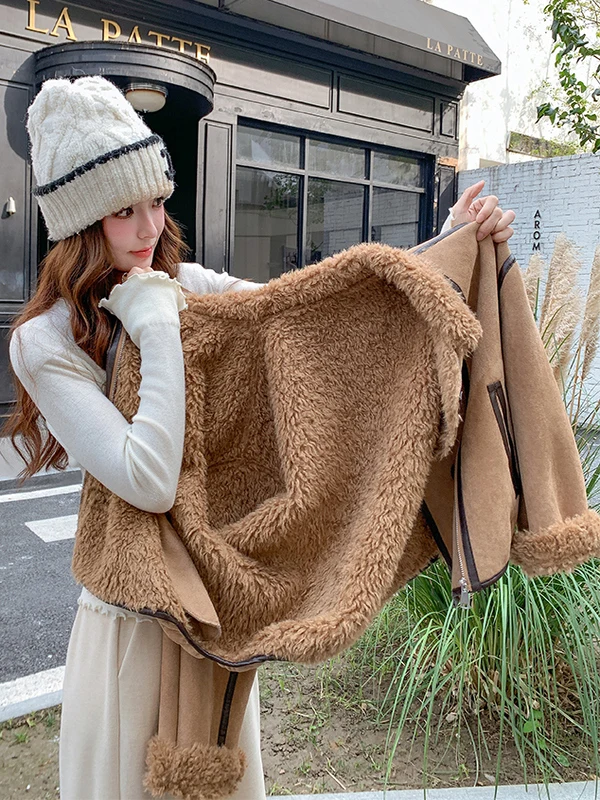 Damska kurtka z futra jagnięcego, ocieplana skórą i futrem, ciepła, codzienna, luźny krój, długi rękaw, zapinana na zamek.