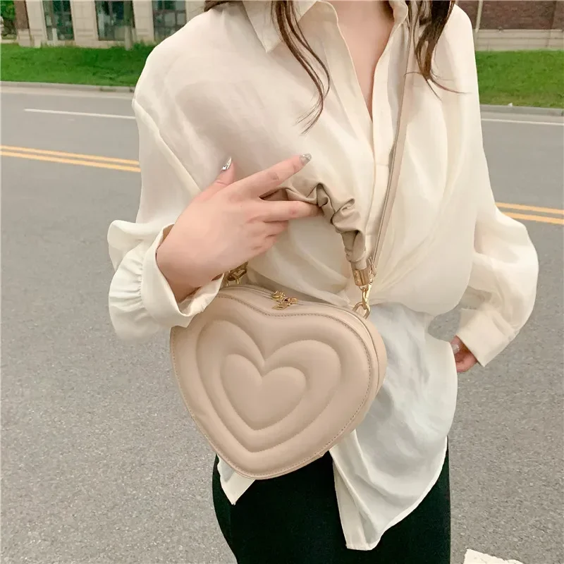 Retro heart-shaped cute bag fashion shoulder messenger bag solid color girl new shopping handbag