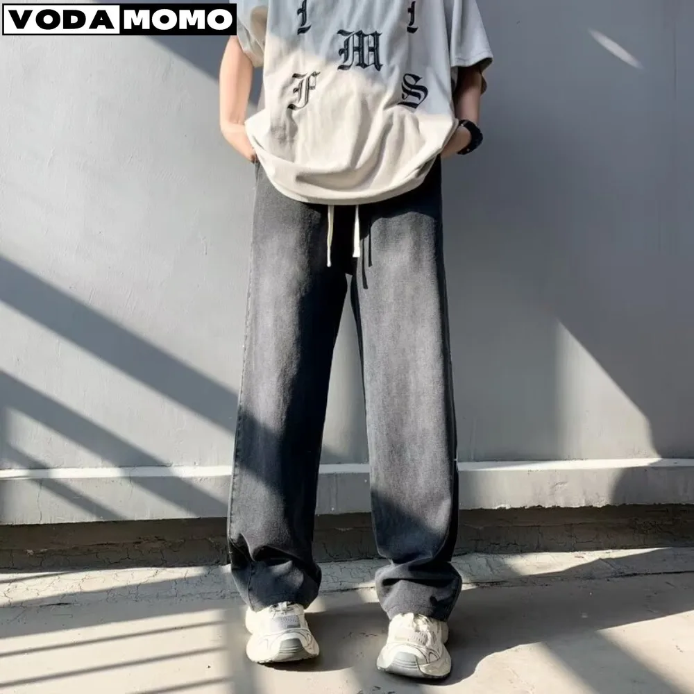 Tendenza del lavaggio dell'acqua Jeans da uomo di moda in stile giapponese vita elastica pantaloni a gamba larga in Denim a gamba dritta di colore solido classico maschile